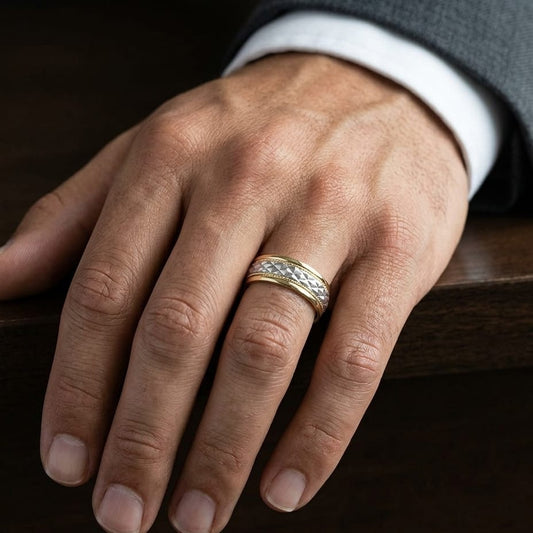 8mm High Polish Cross Hatch Center Carved Wedding Band in 14K Two-Tone Gold, worn on hand, masculine close-up