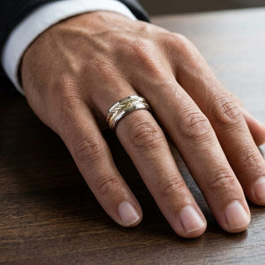 8mm Drop Bevel Wheat Pattern Carved Wedding Band in 14K Two-Tone Gold, worn on hand, masculine close-up