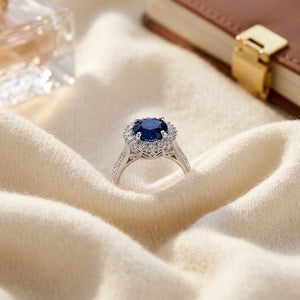 Sapphire & Diamond Prong Halo Ring in 14K White Gold - flat lay