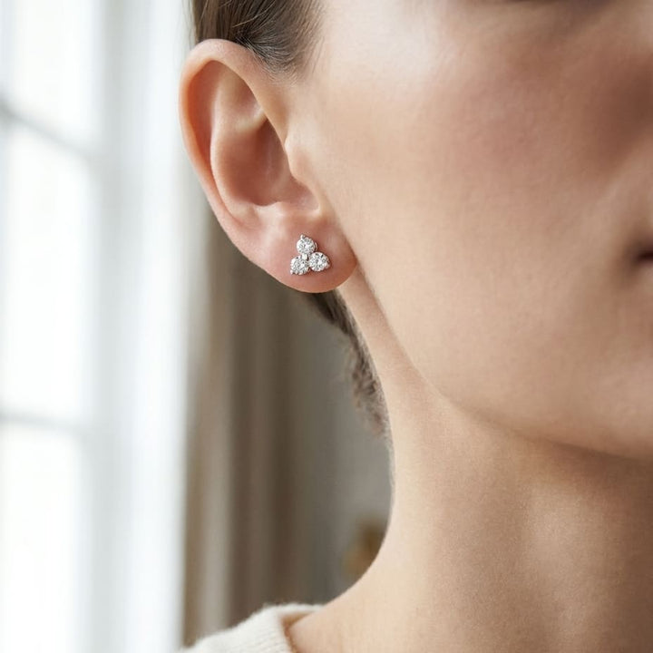 Diamond Flower Earring in 14K White Gold, worn close-up portrait
