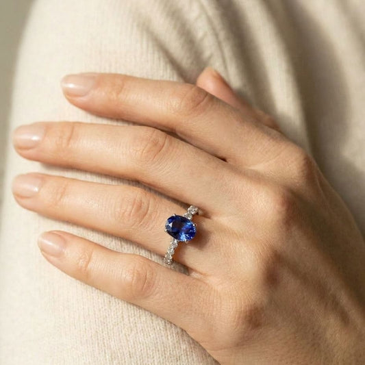 Tanzanite Oval Floating Diamond Ring in 14k White Gold 0.33ctw, worn on hand, close-up