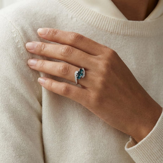 London Blue Topaz Three Stone Swirl Ring 1/8ctw in 14K White Gold - editorial