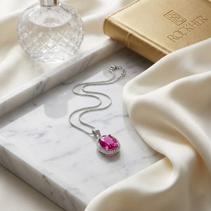 Tourmaline Oval Pendant in 14K White Gold, on marble vanity tray with silk