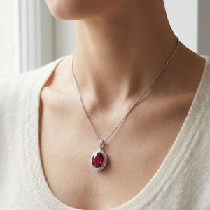 Tourmaline Oval Pendant in 14K White Gold, worn close-up portrait