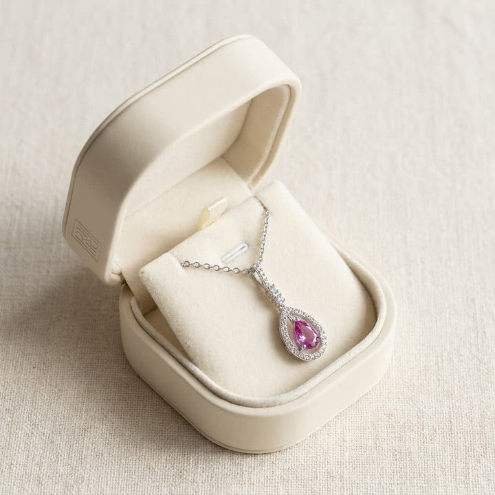 Pink Sapphire & Diamond Pendant, in navy velvet jewelry box