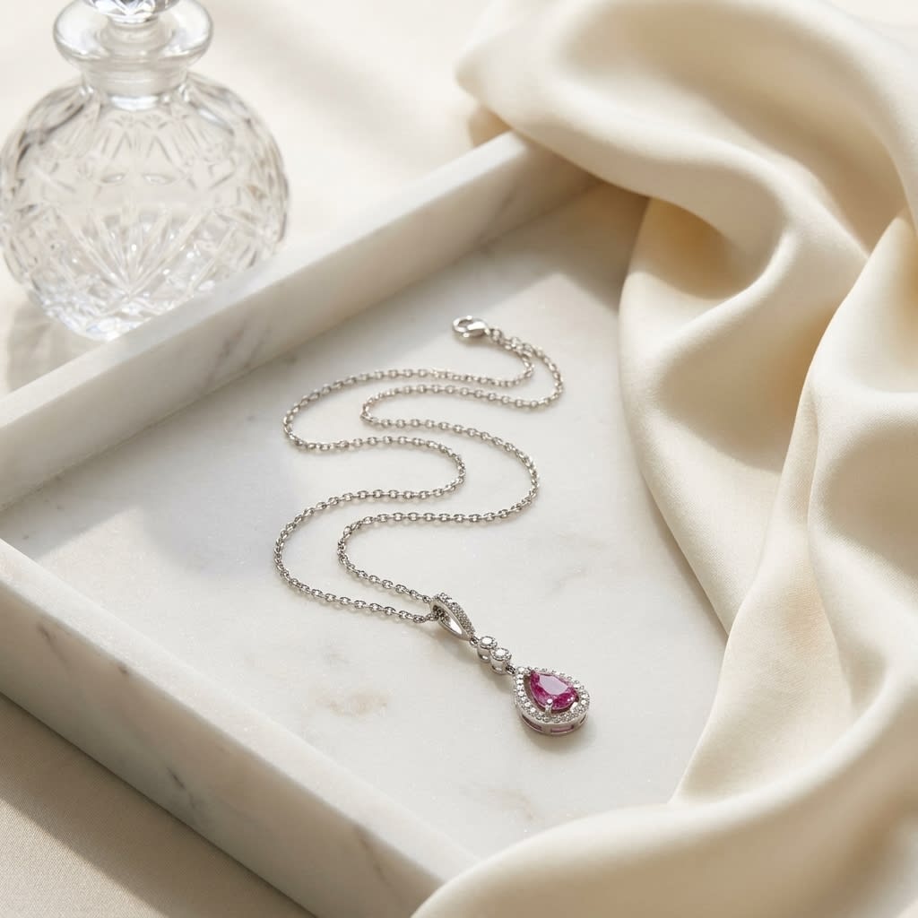Pink Sapphire and Diamond Pendant in 14K White Gold, 1.00ct, on marble vanity tray with silk
