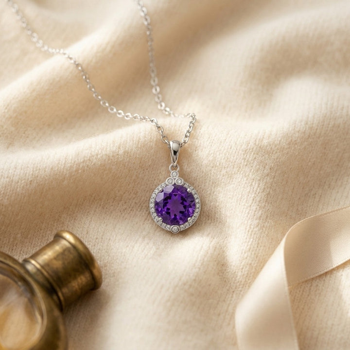 Amethyst & Diamond Round Halo Pendant with Bezel Accent in 14K White Gold - flat lay