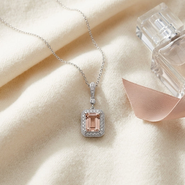 Morganite & Diamond Emerald Cut Halo Dangle Pendant in 14K White Gold - flat lay