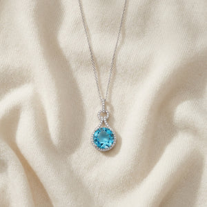 Blue Topaz & Diamond Doorknocker Pendant in 14K White Gold - flat lay
