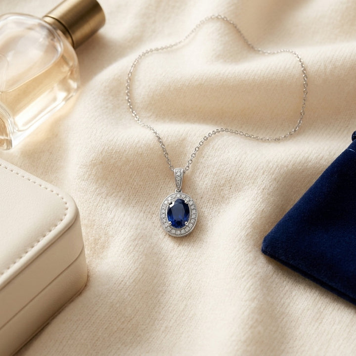 Sapphire & Diamond Pendant in 14K White Gold - flat lay