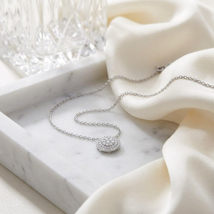 Natural Diamond Round Brilliant Pendant in 14K White Gold, 5 ct. t.w., on marble vanity tray with silk