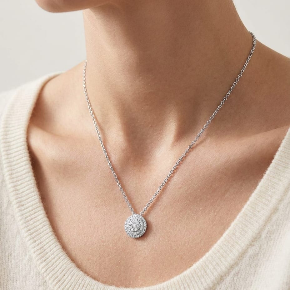 Natural Diamond Round Brilliant Pendant in 14K White Gold, worn close-up portrait