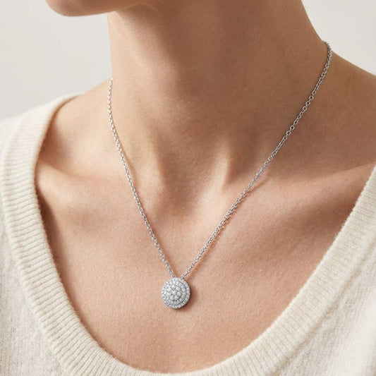 Natural Diamond Round Brilliant Pendant in 14K White Gold, worn close-up portrait