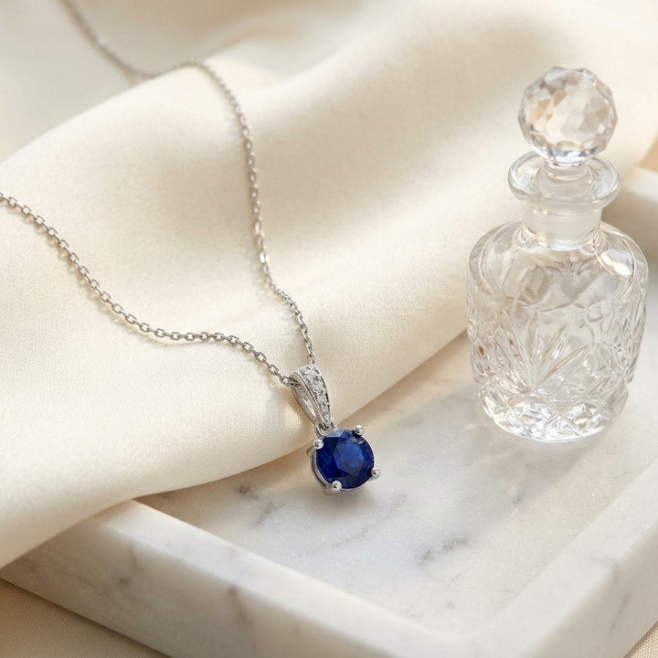 Sapphire Round Solitaire Pendant with Diamond Bail in 14K White Gold - lifestyle