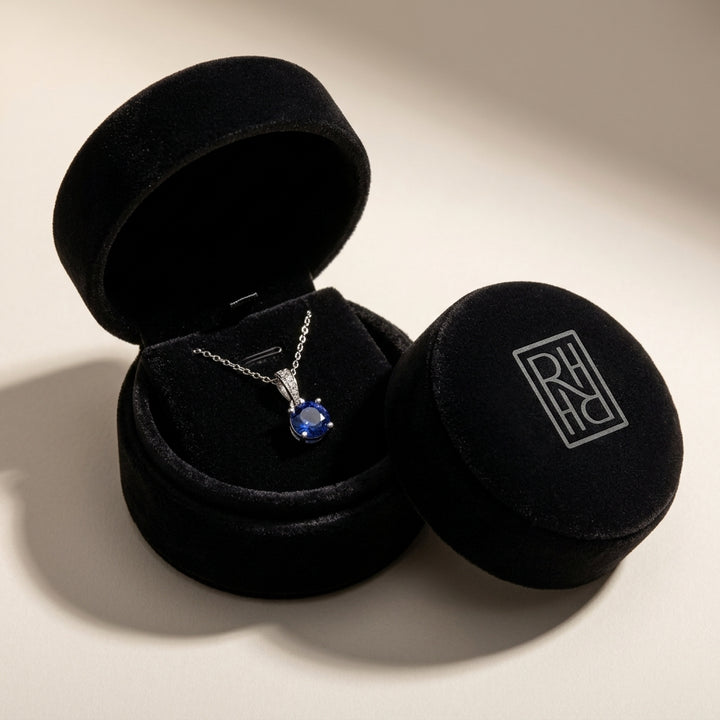 Sapphire Round Solitaire Pendant with Diamond Bail in 14K White Gold - presentation