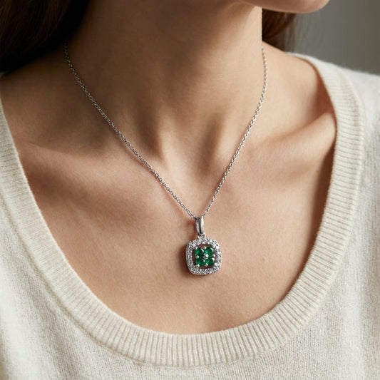 Emerald Pendant in 14K White Gold, worn close-up portrait