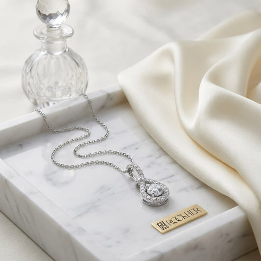 Natural Diamond Round Brilliant Pendant in 14K White Gold, on marble vanity tray with silk