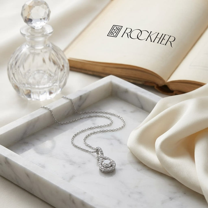 Natural Diamond Round Brilliant Pendant in 14K White Gold, on marble vanity tray with silk