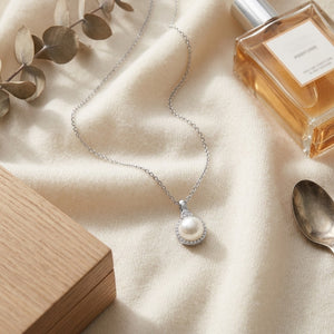 Fresh Water Pearl & Diamond Halo Pendnat in 14K White Gold - flat lay