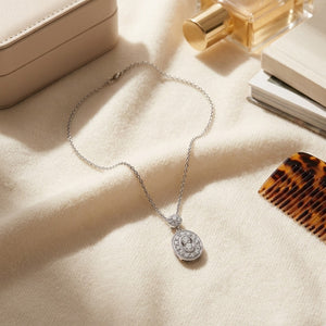 Diamond Oval Halo Dangle Pendant , 17 Inch Chain in 14K White Gold - flat lay