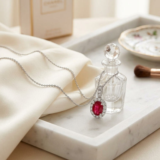 Ruby Oval & Diamond Halo Pendant in 14K White Gold - editorial