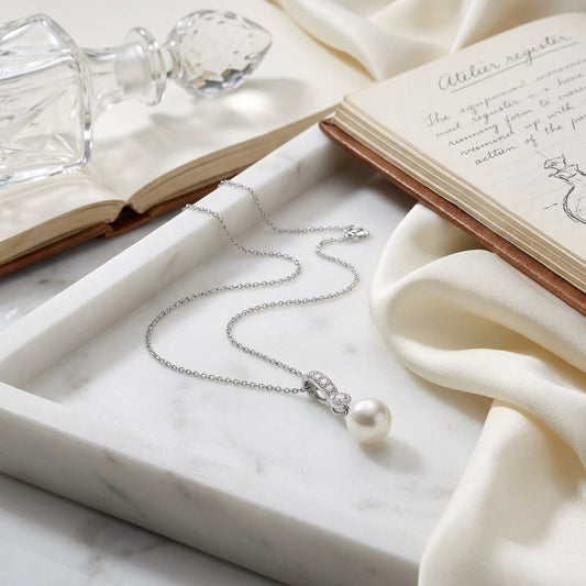 Cultured Pearl Pear Shape Pendant in 14K White Gold, on marble vanity tray with silk