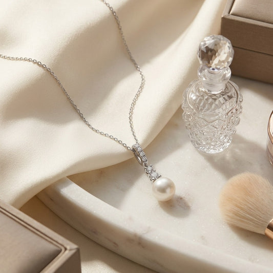 Cultured Pearl & Diamond Pendant with Graduated Prong-Set Bail in 14K White Gold - editorial