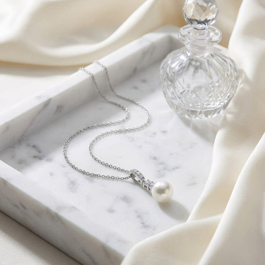 Cultured Pearl Pear Shape Pendant in 14K White Gold, on marble vanity tray with silk
