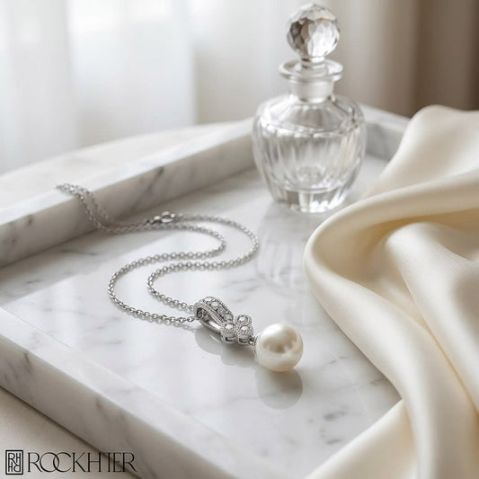 Cultured Pearl Pear Shape Pendant in 14K White Gold, on marble vanity tray with silk