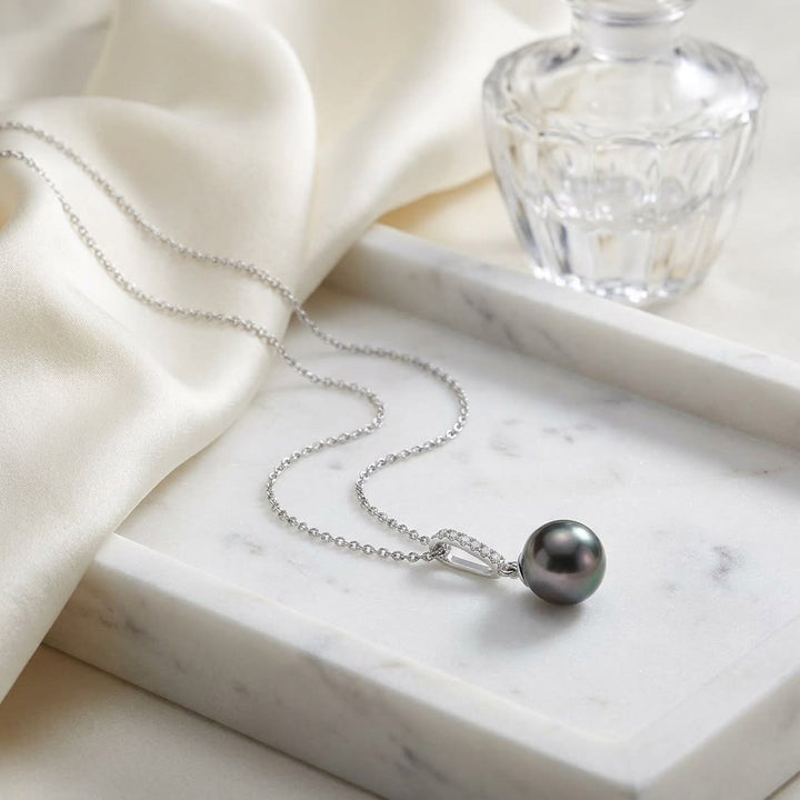 South Sea Pearl Pear Shape Pendant in 14K White Gold, on marble vanity tray with silk