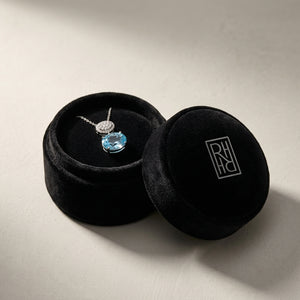 Blue Topaz Oval & Diamond 1/16ctw Pendant Set with Chain in 14K White Gold - presentation