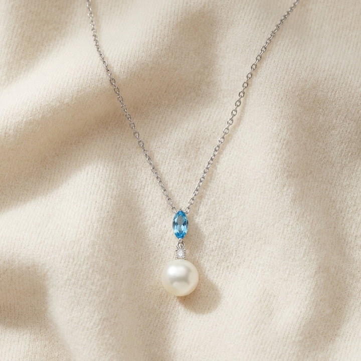 Freshwater Pearl Marquise Blue Topaz & Diamond Pendant 16-18in Adj Chain in 14K White Gold - flat lay