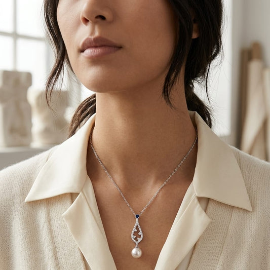 Akoya Pearl Sapphire & Diamond Drop Pendant 1/5ctw 18-in Adj Cable Ch in 14K White Gold - editorial