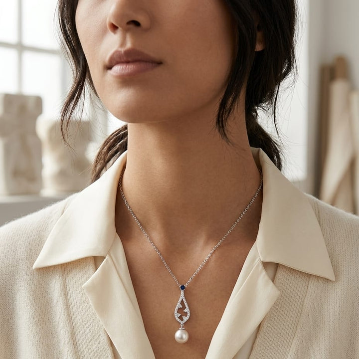 Akoya Pearl Sapphire & Diamond Drop Pendant 1/5ctw 18-in Adj Cable Ch in 14K White Gold - editorial
