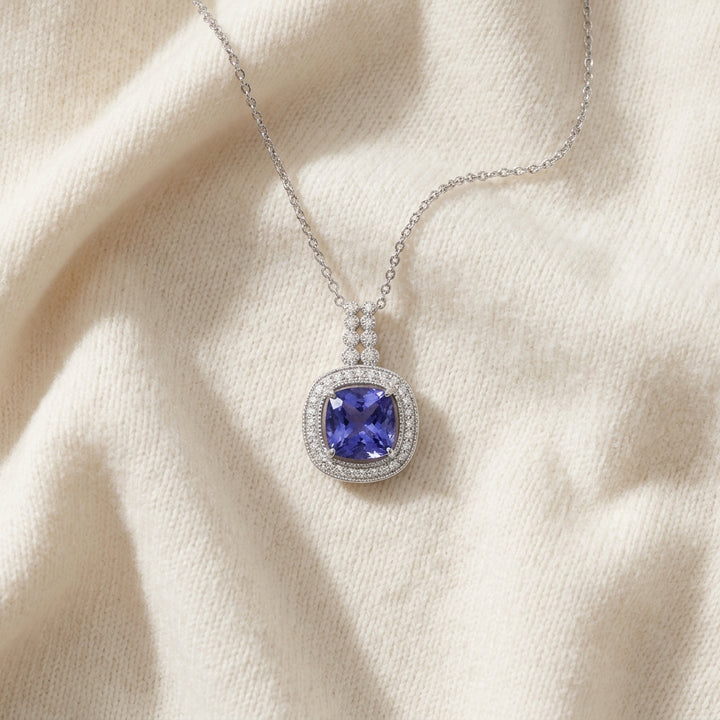 Tanzanite Cushion Halo Diamond Pendant 1/5ctw in 14K White Gold - flat lay