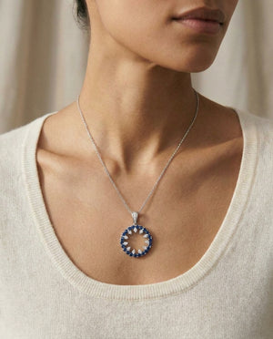 Sapphire and Diamond Circle Pendant in 14k White Gold 0.52ctw, worn close-up portrait