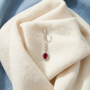 Ruby & Diamond Dangle Oval Halo Earrings in 14K White Gold - flat lay