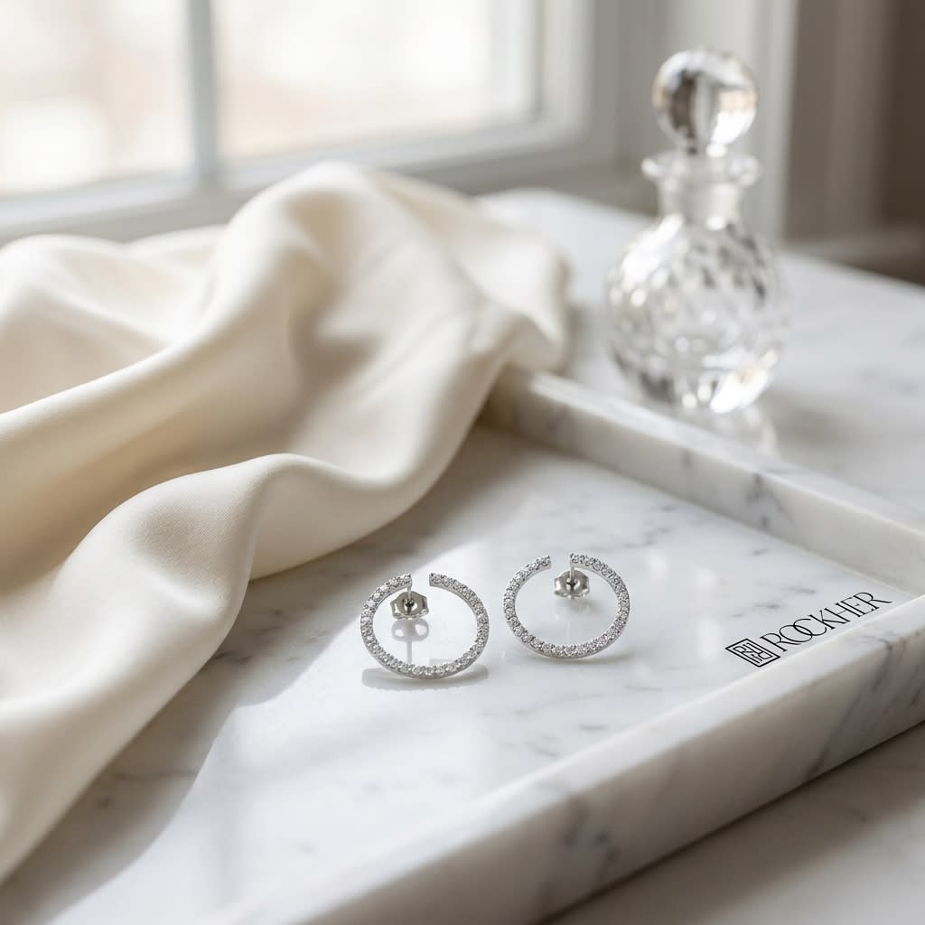 Diamond Open Circle Earrings in 14K White Gold 3/4ctw, on marble vanity tray with silk