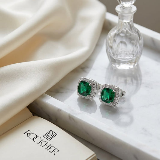 Created Emerald Square Stud Earrings in 14K White Gold, on marble vanity tray with silk