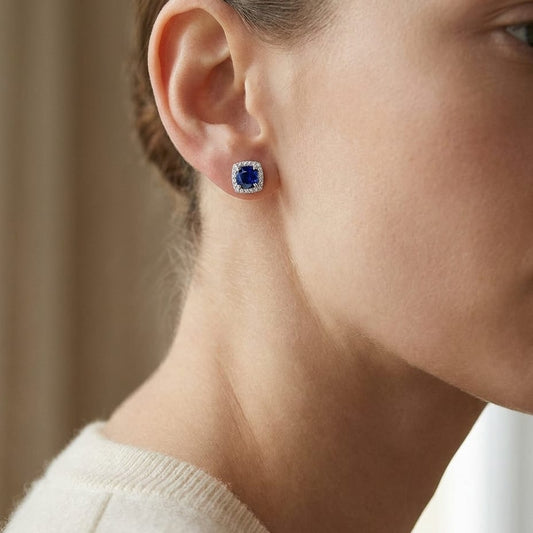 Sapphire Cushion Stud Earrings in 14K White Gold, worn close-up portrait
