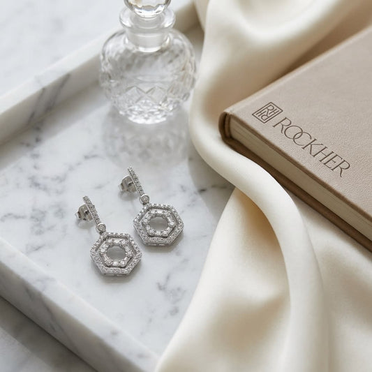 14K White Gold Hexagon Drop Earrings, on marble vanity tray with silk