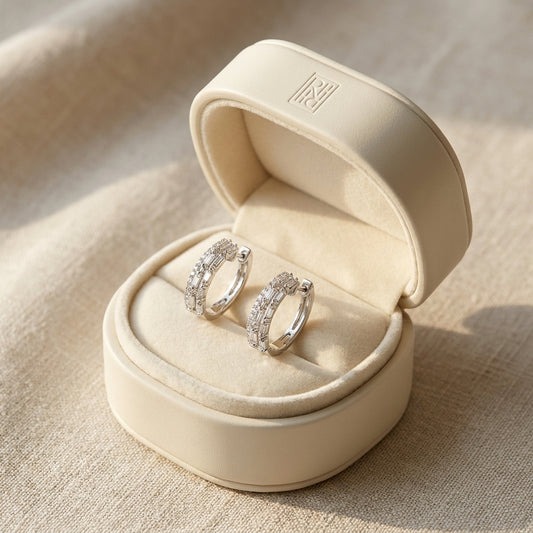 Diamond Baguette And Round Brilliant Multi-row Oval Hinged Hoop Earring in 14K White Gold, in navy velvet jewelry box