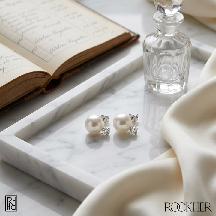 Cultured Pearl Pear Shape Stud Earrings in 14K White Gold, on marble vanity tray with silk