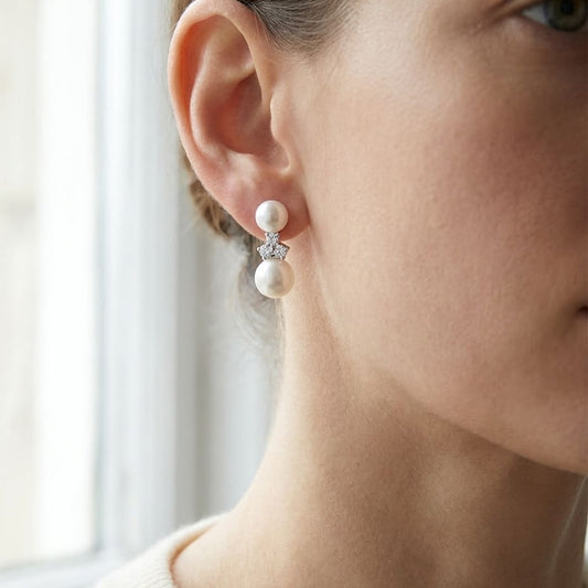 Pearl Pear Shape Stud Earrings in 14K White Gold, worn close-up portrait