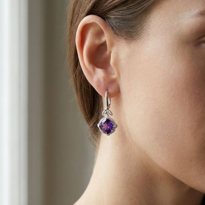 Amethyst And Diamond Leaf Drop Earrings in 14K White Gold, worn close-up portrait