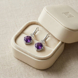 Amethyst And Diamond Leaf Drop Earrings in 14K White Gold, in navy velvet jewelry box