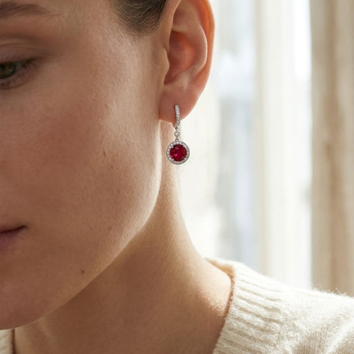 Ruby And Diamond Earrings in 14K White Gold, worn close-up portrait
