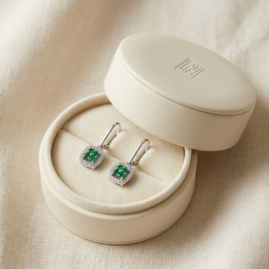 Created Emerald And Diamond Dangle Clover Leverback Earrings in 14K White Gold, in navy velvet jewelry box