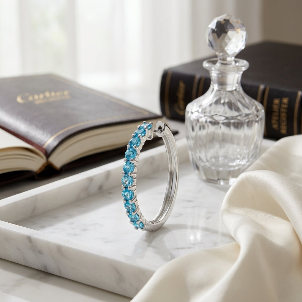 14K Gold 2.40ctw Blue Topaz Hoop Earrings in 14K White Gold - editorial
