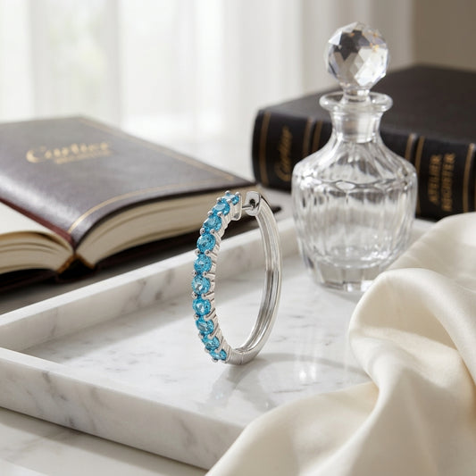 14K Gold 2.40ctw Blue Topaz Hoop Earrings in 14K White Gold - editorial